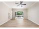 Light filled main bedroom features hardwood flooring, ensuite bath, and access to deck at 251 Waller Nw Cir, Marietta, GA 30064