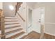 Staircase with wooden steps and a white door leading to another room at 251 Waller Nw Cir, Marietta, GA 30064