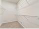 Walk-in closet with shelving for organization at 251 Waller Nw Cir, Marietta, GA 30064