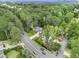 An aerial shot of the area reveals the house nestled among lush green trees at 2638 Clairmont Rd, Atlanta, GA 30329
