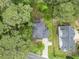 Bird's eye view of the property showing a modern home with a spacious driveway and mature trees at 2638 Clairmont Rd, Atlanta, GA 30329