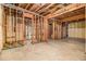 Unfinished basement featuring exposed wooden framing, insulation, and ready for customization at 2638 Clairmont Rd, Atlanta, GA 30329