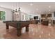 Entertaining basement includes a pool table, bar area and mini bar at 2638 Clairmont Rd, Atlanta, GA 30329