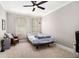 Bedroom with carpet, ceiling fan, and a window with natural light at 2638 Clairmont Rd, Atlanta, GA 30329