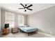 Bedroom with carpet, ceiling fan, and a window with natural light at 2638 Clairmont Rd, Atlanta, GA 30329
