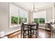 Breakfast nook offers a round table and a view to the outdoor deck at 2638 Clairmont Rd, Atlanta, GA 30329
