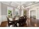 Spacious dining room with decorative ceilings, large windows, and hardwood floors at 2638 Clairmont Rd, Atlanta, GA 30329