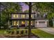Beautiful two-story home with a covered front porch, stone accents and well-manicured landscaping at 2638 Clairmont Rd, Atlanta, GA 30329