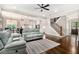 Open-concept living room flowing into the kitchen and foyer with a staircase at 2638 Clairmont Rd, Atlanta, GA 30329