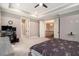 Spacious main bedroom boasts tray ceilings and an entry into the main bathroom at 2638 Clairmont Rd, Atlanta, GA 30329
