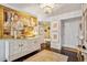 Elegant condo foyer with a statement buffet and a dark wood floor at 275 13Th Ne St # 201, Atlanta, GA 30309