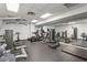 Well-equipped fitness center with various exercise machines, weights, and mirrors at 275 13Th Ne St # 201, Atlanta, GA 30309