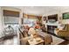 Inviting living room featuring a cozy fireplace, stylish furnishings, and an abundance of natural light at 275 13Th Ne St # 201, Atlanta, GA 30309