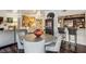 Open living area features a dining table, comfortable seating and a modern kitchen at 275 13Th Ne St # 201, Atlanta, GA 30309