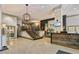 Spacious lobby with wood-paneled reception desk, staircase, and decorative lighting at 275 13Th Ne St # 201, Atlanta, GA 30309