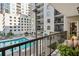 Relaxing pool area with lounge chairs and lush landscaping, perfect for outdoor enjoyment at 275 13Th Ne St # 201, Atlanta, GA 30309