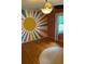 Bright bedroom featuring custom wall art, hardwood floors, and lots of natural light at 406 S Hillcrest Sw Dr, Marietta, GA 30064