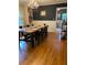 Traditional dining room featuring hardwood floors, chandelier, and a large wooden table perfect for Gathering gatherings at 406 S Hillcrest Sw Dr, Marietta, GA 30064