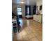 Spacious flex room with tiled floors, desk, office chairs, and a view of the backyard at 406 S Hillcrest Sw Dr, Marietta, GA 30064