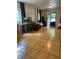 Spacious flex room with tiled floors, desk, office chairs, and a view of the backyard at 406 S Hillcrest Sw Dr, Marietta, GA 30064