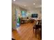 Living room with hardwood floors, TV, and comfortable seating at 406 S Hillcrest Sw Dr, Marietta, GA 30064