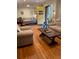Living room with hardwood floors and comfortable seating at 406 S Hillcrest Sw Dr, Marietta, GA 30064