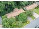 Aerial view of a home with a large yard surrounded by mature trees at 4714 Darlene Way, Tucker, GA 30084
