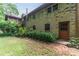 View of backyard with brick house at 4714 Darlene Way, Tucker, GA 30084