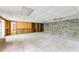 Basement with brick wall, and carpeted floors at 4714 Darlene Way, Tucker, GA 30084