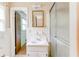 Bathroom featuring a vanity with a sink and a shower with glass doors at 4714 Darlene Way, Tucker, GA 30084