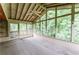 Sunroom offering views of the surrounding greenery from its many windows at 4714 Darlene Way, Tucker, GA 30084