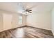 Bright and welcoming living room with stylish flooring and a door leading to the exterior at 7127 Greenway Sw Cv, Covington, GA 30014