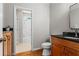 Bathroom featuring a vanity with a granite countertop and a shower/tub combo at 1000 Gunter Ct, Alpharetta, GA 30022