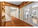 Hallway with access to a kitchen and a view of the front of the home at 1000 Gunter Ct, Alpharetta, GA 30022