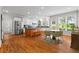 Spacious kitchen and eat-in area with hardwood floors and stainless steel appliances at 1000 Gunter Ct, Alpharetta, GA 30022