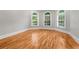 Cozy room featuring ample light, arched windows and white trim at 1000 Gunter Ct, Alpharetta, GA 30022