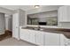 Functional kitchen with white cabinetry, durable countertops, and classic tile floors at 1234 Wellhouse Walk, Stone Mountain, GA 30088