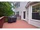 Exterior of a two story home with a painted back deck with grill and access to the home at 2540 Ridgehurst Dr, Buford, GA 30518