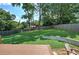 Backyard featuring a deck with beautiful landscaping at 2646 Rockcliff Road Se, Atlanta, GA 30316