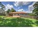 Expansive backyard features a deck, privacy fence and lovely green space at 2646 Rockcliff Road Se, Atlanta, GA 30316
