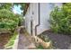 Exterior of home showcasing lush garden area and charming landscape at 2646 Rockcliff Road Se, Atlanta, GA 30316