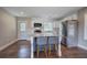 Updated kitchen features granite countertops, island seating, and stainless steel appliances at 2646 Rockcliff Road Se, Atlanta, GA 30316