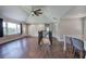 Spacious open-concept living room with hardwood floors connecting to the kitchen area at 2646 Rockcliff Road Se, Atlanta, GA 30316