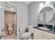 Bright bathroom featuring modern fixtures, a stylish vanity, and tiled floors at 764 Patterns Sw Dr, Mableton, GA 30126