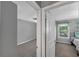 Bedroom is spacious and bright with carpeted floors and a view at 764 Patterns Sw Dr, Mableton, GA 30126