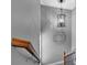 Hallway featuring modern lighting, decorative wall art, and a neutral color scheme at 764 Patterns Sw Dr, Mableton, GA 30126