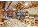 Unfinished basement featuring exposed beams, shelving, decor, and a billiards room at 1101 Parkland Se Run, Smyrna, GA 30082