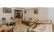 Basement area featuring a seating area, a table, decor and partially finished walls at 1101 Parkland Se Run, Smyrna, GA 30082