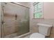 Updated bathroom featuring tile surround and glass shower enclosure at 1101 Parkland Se Run, Smyrna, GA 30082