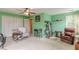 Bedroom with neutral carpet features a comfortable recliner and nearby closets at 1101 Parkland Se Run, Smyrna, GA 30082